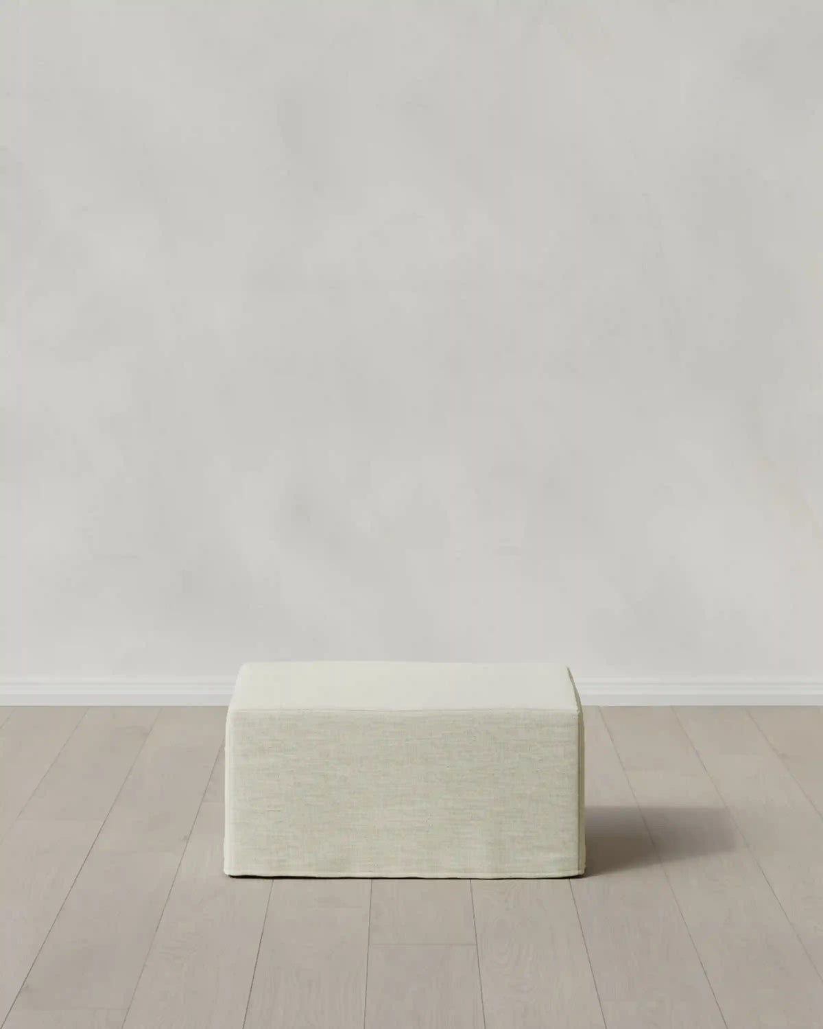 Ellery Slipcover Ottoman in Performance Linen