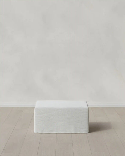 Ellery Slipcover Ottoman in Performance Linen