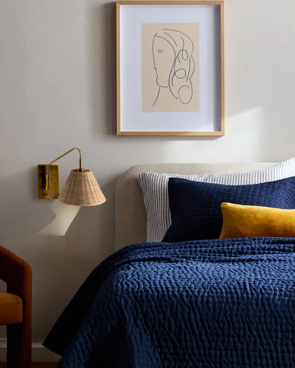 Articulating Sconce with Rattan Shade